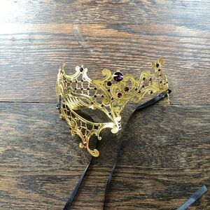 Elegant Gold Masquerade Mask with Purple Gems